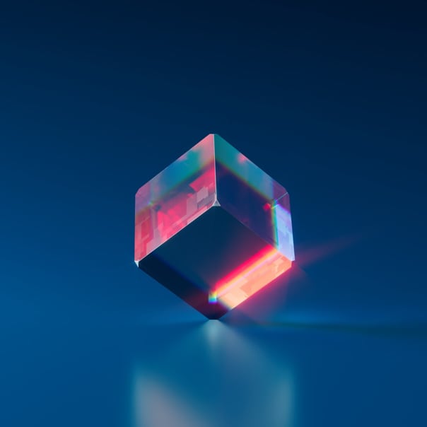 Inspiring image of a transparent cube standing on a corner with a blue background